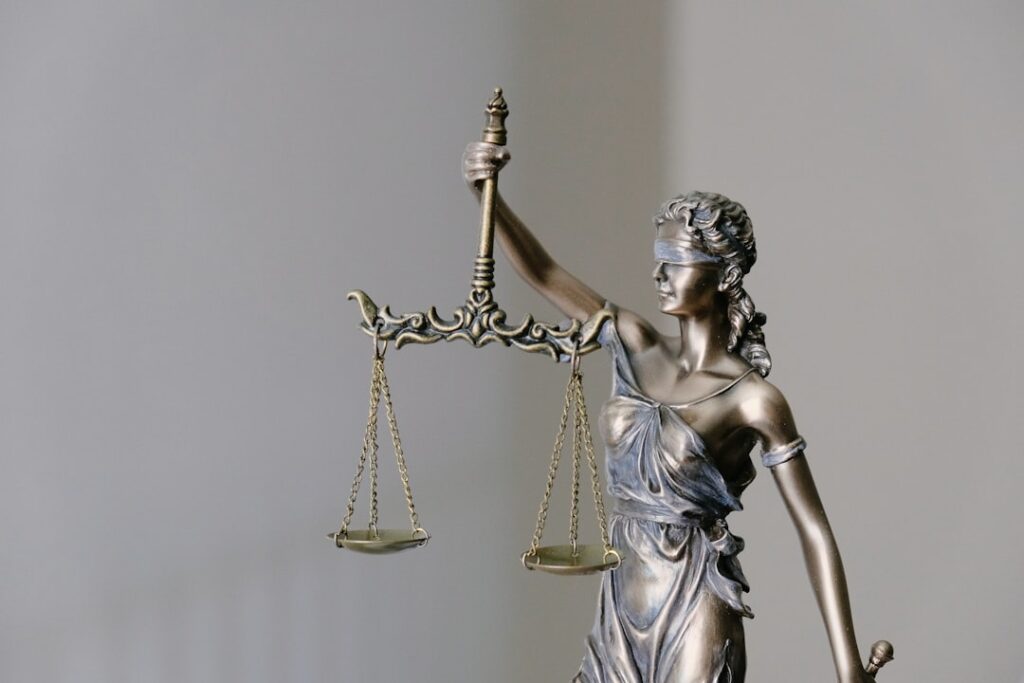 lady justice statue with scales and sword