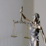 lady justice statue with scales and sword