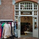 Recycle center with clothes and bicycles inside