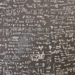 a blackboard with a lot of writing on it